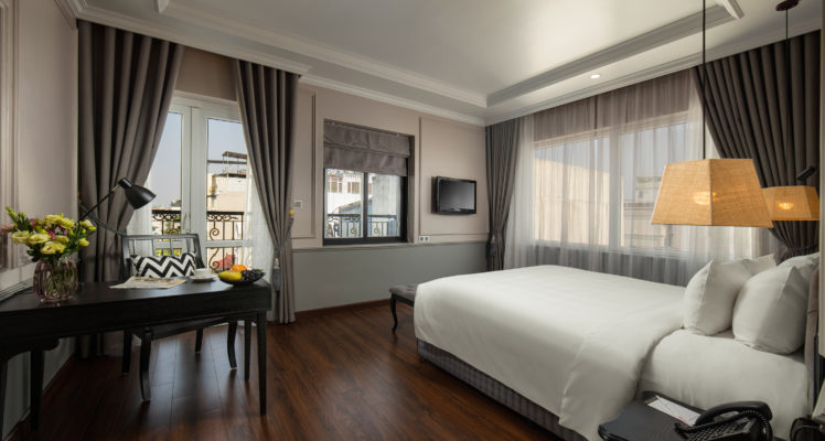 suite room with balcony hanoi city view
