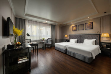 junior suite city view room twin beds in hanoi